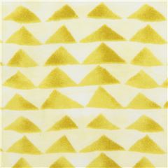 Cotton and Steel knit fabric in cream with chartreuse triangles