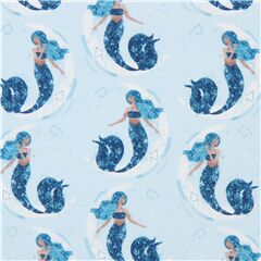 light blue Dear Stella mermaid fabric with moons