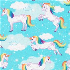 light blue Robert Kaufman fabric with magical unicorns and glitter