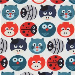 light cream Stof Fabrics knit fabric with teal and orange animal faces