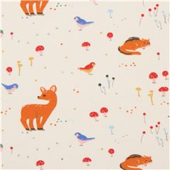 organic cream knit fabric with mushrooms and animals