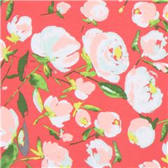 red-orange knit fabric with flower leaf