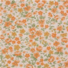 small flowers orange densely packed on off white smooth knit fabric Japan